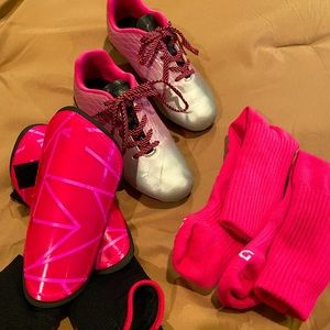Girls Soccer cleats, shin guards and socks